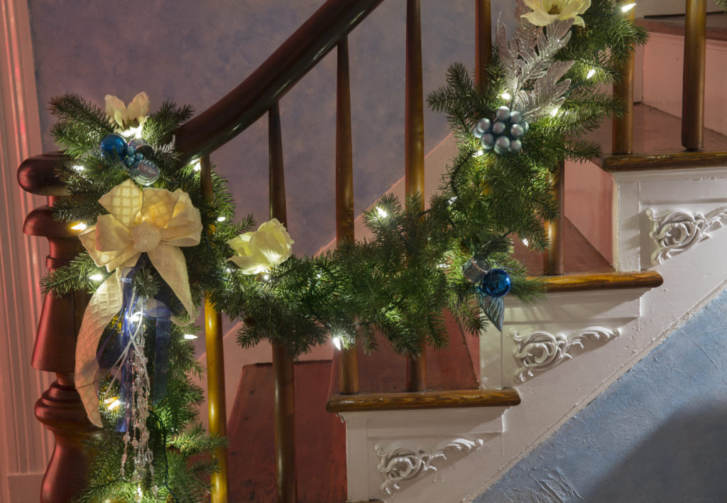 Christmas garland draped over bannister